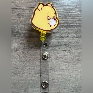 Yellow Bear badge reel